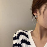 Exaggerated Silver Love Heart Clip Earrings