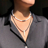 Soft Pottery Round Female Necklace with Pine Stone Pendant