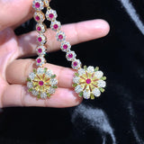 Silver Flower Earrings with Cubic Zirconia Pendant