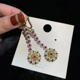 Silver Flower Earrings with Cubic Zirconia Pendant