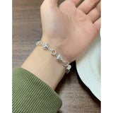 Heart-Shaped Hollow Circle Sterling Silver Bracelet