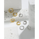 F.I.N.S Geometric Small Circular Twist Silver Hoop Earrings