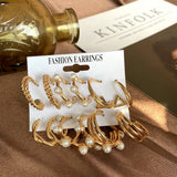 Women's Golden Hoop Earrings with Pearl Charm for Parties