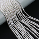 Natural Freshwater Pearl Strand 3.5-4mm Button Shaped Flat Round