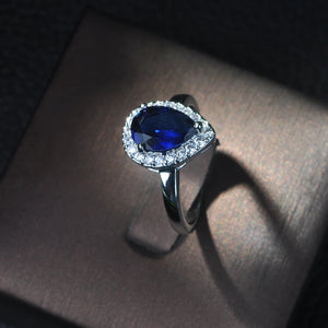 Green Crystal Tear Drop Engagement Ring with Zirconia Stones