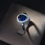 Green Crystal Tear Drop Engagement Ring with Zirconia Stones