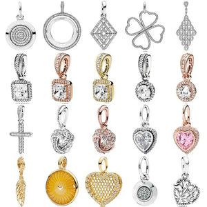 Sterling Silver Spinning Hearts Clover Cross Necklace Pendant