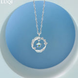 Women's Silver Feather Pendant Necklace and Bracelet Set