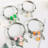 Stainless Steel Bangle with Pearl Sea Shell Pendant