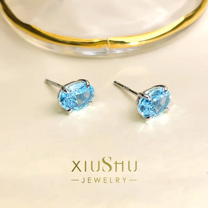 Stylish Dan Shaped Hailanbao Small Earrings 925 Silver