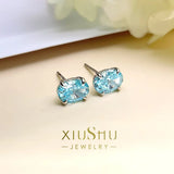 Stylish Dan Shaped Hailanbao Small Earrings 925 Silver