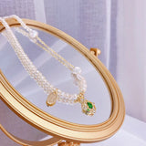 Baroque Pearl Necklace with Zircon and Emerald Inlay