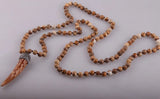 Knot Beads Necklace with Ox Horn Pendant