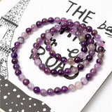 Natural Cacoxenite Auralite 23 Purple Rutilated Quartz Bracelet