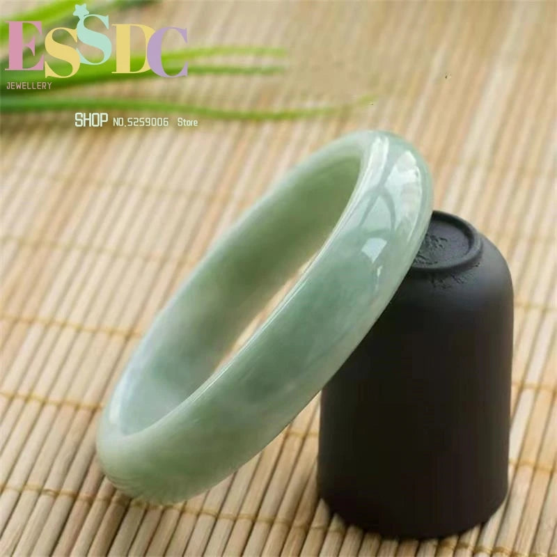 Emerald Floating Flower Round Carving Jade Bracelet
