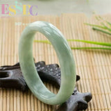 Emerald Floating Flower Round Carving Jade Bracelet