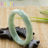 Emerald Floating Flower Round Carving Jade Bracelet