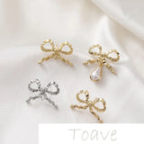 Gold-Coated Bow Tie with Silver Needle Earrings