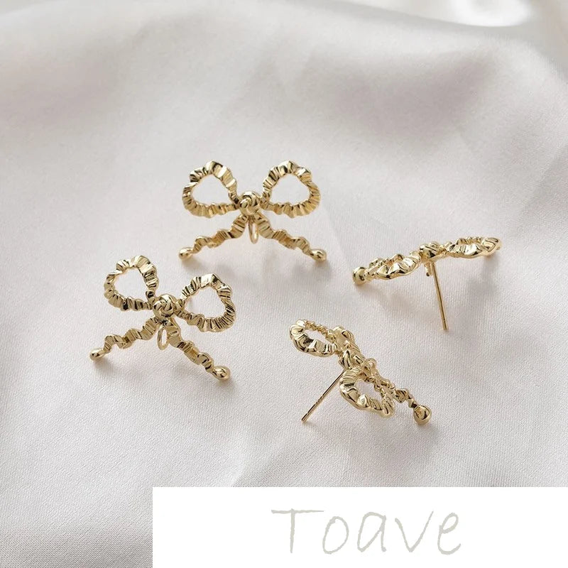 Gold-Coated Bow Tie with Silver Needle Earrings
