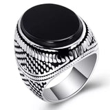 Ancient Silver Eagle Signet Ring with Green Zircon Inlay