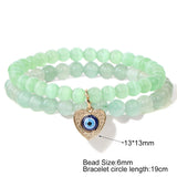 Rose Quartz Pink Cat Eye Bracelet with Evil Eye Charm