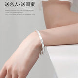 S999 Silver Diamond Round Belly Bangle