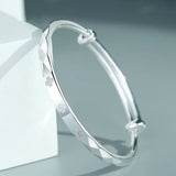 S999 Silver Diamond Round Belly Bangle