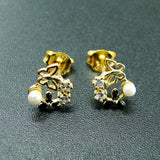 Yellow CZ & Pearl Butterfly Stud Earrings in 925 Sterling Silver