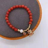 Red Agates Beads Bracelet with Tiger Pendant