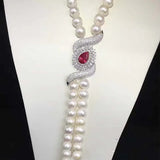 Zircon Inlay Eyes Tassel Pendant Sweater Chain
