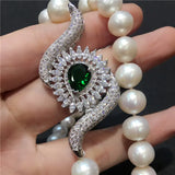 Zircon Inlay Eyes Tassel Pendant Sweater Chain
