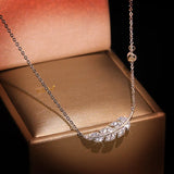 Zircon Inlaid Leaf Necklace with Feather Pendant
