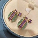 Vintage Women Light Peridot Green Earrings with Micro-inlaid Purple CZ