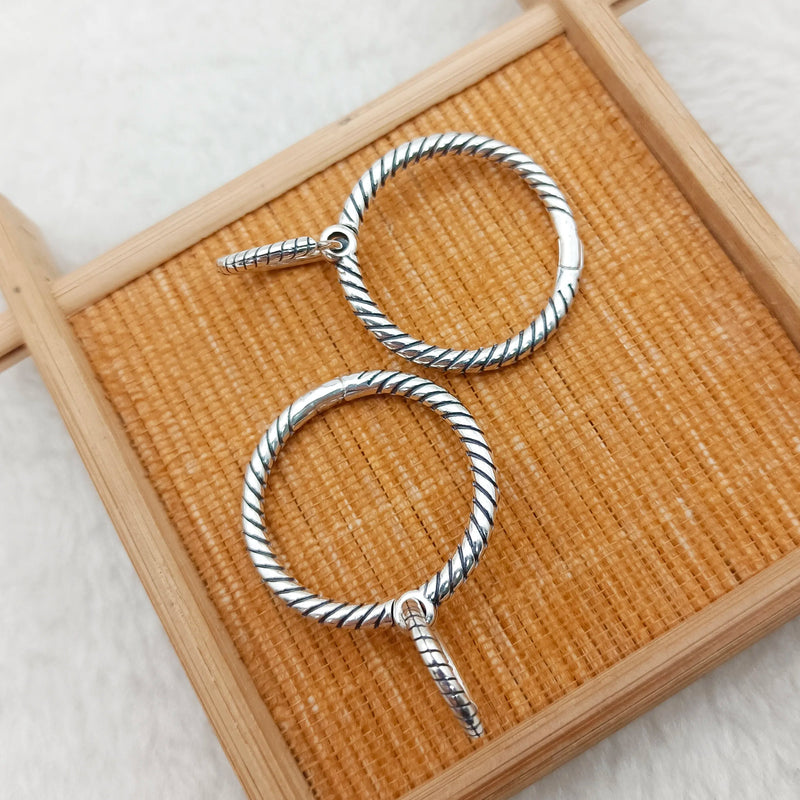 Silver Snake Bone Geometric Round Earrings
