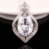 Large Oval Zircon Pendant with Inlaid Zircons