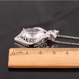 Large Oval Zircon Pendant with Inlaid Zircons