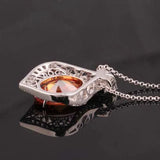 Large Oval Zircon Pendant with Inlaid Zircons