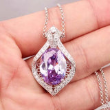 Large Oval Zircon Pendant with Inlaid Zircons