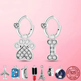 925 Silver Dog Paw & Travel CZ Earrings