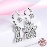 925 Silver Dog Paw & Travel CZ Earrings