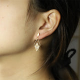 Hand-carved White Jade 925 Silver Gufajin Earrings Studs