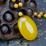 Hand-Carved Yellow Egg Noodle Pendant Charm Necklace