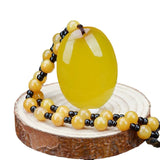 Hand-Carved Yellow Egg Noodle Pendant Charm Necklace