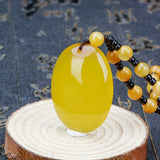 Hand-Carved Yellow Egg Noodle Pendant Charm Necklace