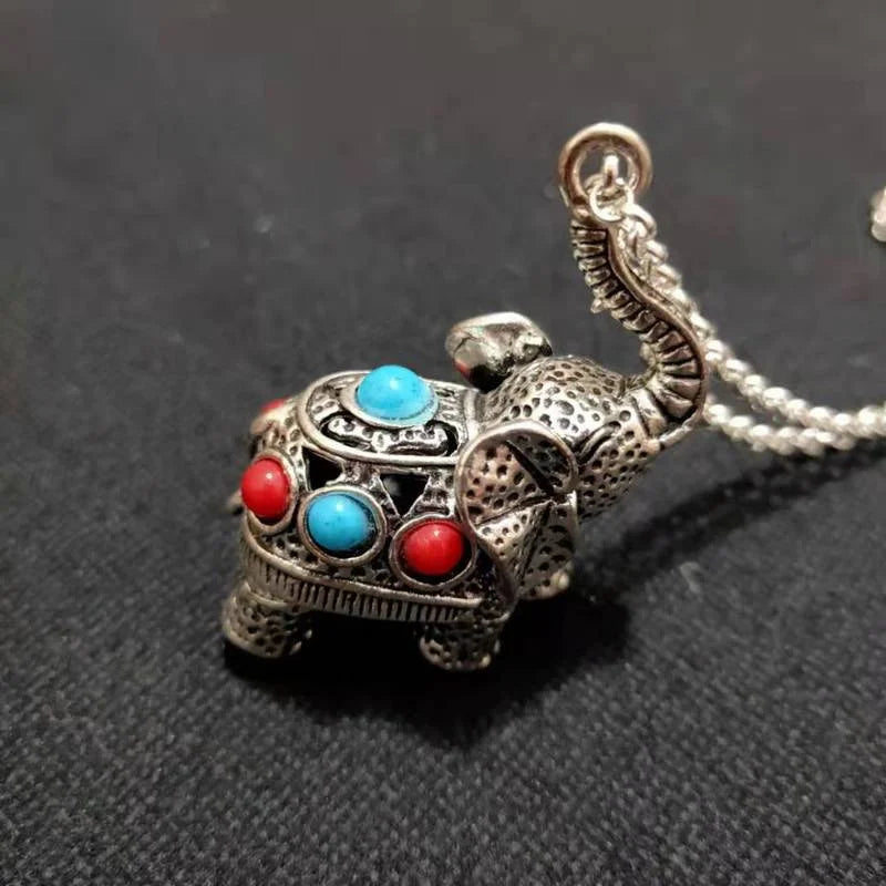 Tibetan Silver Elephant Pendant Red Turquoise Inlay