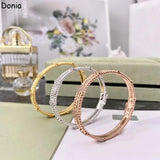 Donia Jewelry Four-Leaf Flower Zircon Bracelet
