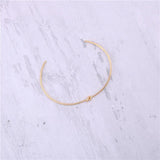 High End PVD Plated Double Loop Knotted Opening Bracelet Drop
