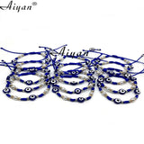 12Pcs Eyes Woven Multi-Color Bracelet with 6MM Pearl Snowflake Accessories