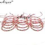 12Pcs Eyes Woven Multi-Color Bracelet with 6MM Pearl Snowflake Accessories