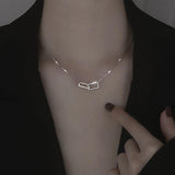 Double Ring Cross Necklace with Diamond Accent